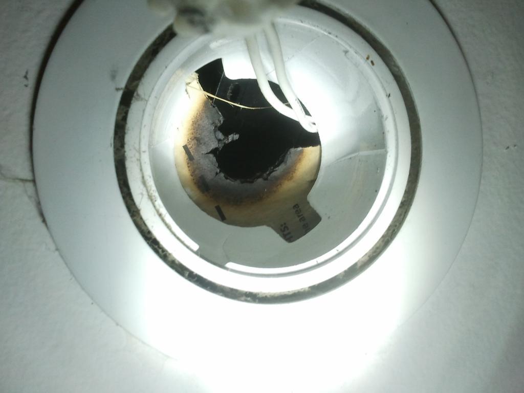 Downlight with visible burning