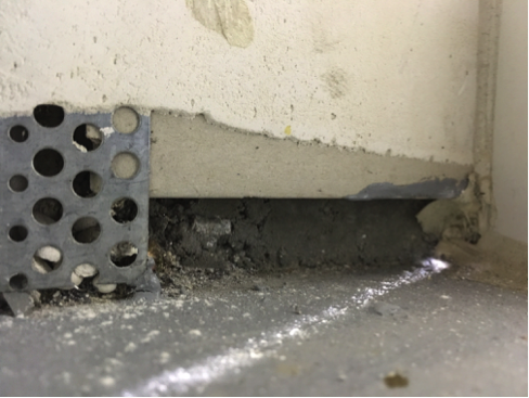 Hole under corner plaster