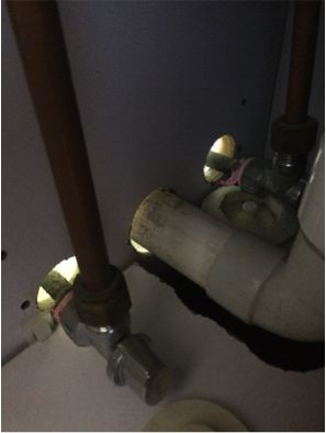 Foam-a-fill sealing penetrations through bathroom cabinets